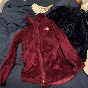 Purple/pink north face zip up.